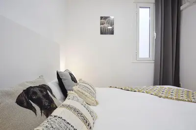 Cama o camas de una habitación en LEEWAYS APARTMENT XXV in GRAN VÍA