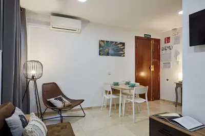 Una televisión o centro de entretenimiento en LEEWAYS APARTMENT XXV in GRAN VÍA