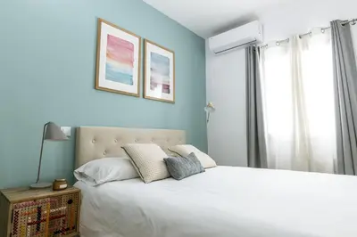 Cama o camas de una habitación en Moderno y Chic 2BR2BA apartmento en Chueca