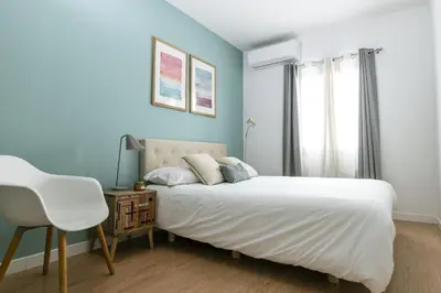 Cama o camas de una habitación en Moderno y Chic 2BR2BA apartmento en Chueca