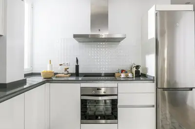 Una cocina o zona de cocina en Moderno y Chic 2BR2BA apartmento en Chueca