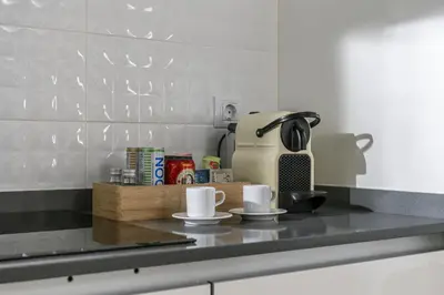 Una cocina o zona de cocina en Moderno y Chic 2BR2BA apartmento en Chueca