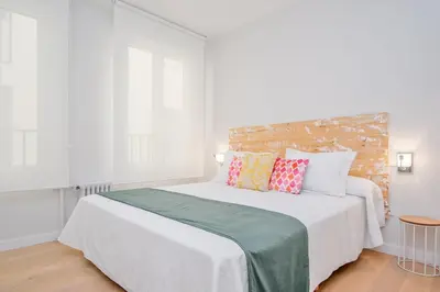 Cama o camas de una habitación en Stylish 3-Bed Apartment in Madrid’s Golden Mile