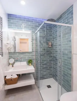 Un baño de MIMA Suites Chueca