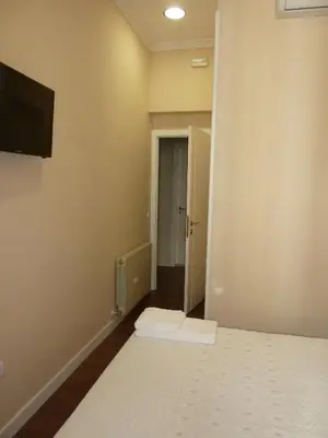 Cama o camas de una habitación en Hostal Mayor