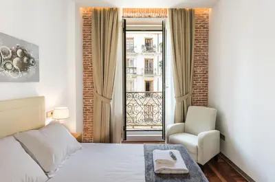 Cama o camas de una habitación en PUERTA DEL SOL CITY CENTER III