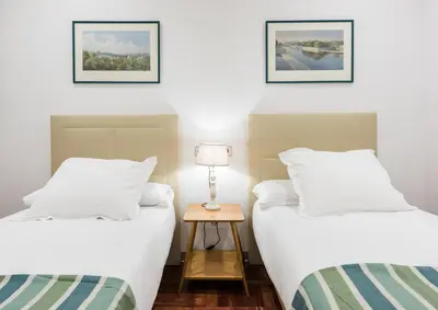 Cama o camas de una habitación en PUERTA DEL SOL CITY CENTER III
