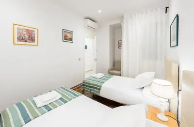 Cama o camas de una habitación en PUERTA DEL SOL CITY CENTER III