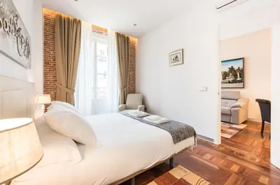 Cama o camas de una habitación en PUERTA DEL SOL CITY CENTER III