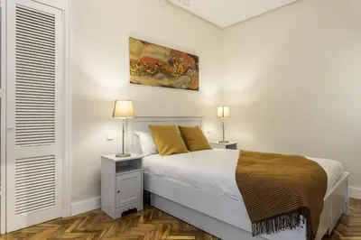 Cama o camas de una habitación en Waou Plaza de España I - Alquiler Corta Duración