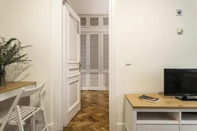 Una televisión o centro de entretenimiento en Waou Plaza de España I - Alquiler Corta Duración