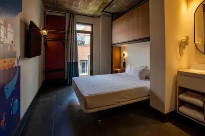 Cama o camas de una habitación en The Central House Madrid Lavapiés