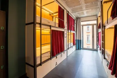 Cama o camas de una habitación en The Central House Madrid Lavapiés