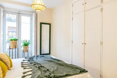 Cama o camas de una habitación en Luxury Belmont Puerta del Sol