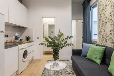 Una cocina o zona de cocina en Waou Malasaña II - Alquiler Corta Duración