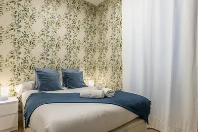 Cama o camas de una habitación en Waou Malasaña II - Alquiler Corta Duración
