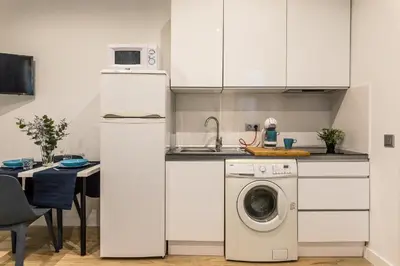 Una cocina o zona de cocina en Waou Malasaña II - Alquiler Corta Duración