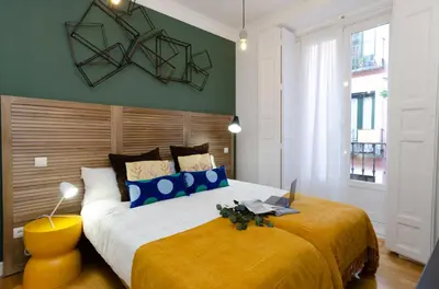 Cama o camas de una habitación en Palacio Premium Stay
