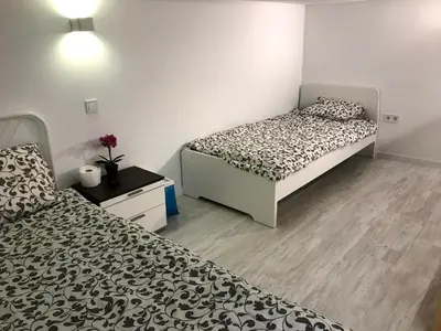 Cama o camas de una habitación en Cozy Apartment Malasaña FREE Parking