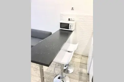 Una televisión o centro de entretenimiento en Estudio Estilo Nórdico Madrid (Malasaña Gran Vía)
