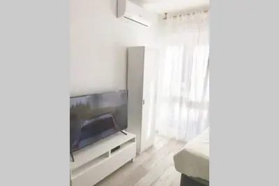 Una televisión o centro de entretenimiento en Estudio Estilo Nórdico Madrid (Malasaña Gran Vía)