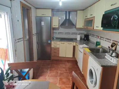 Una cocina o zona de cocina en Alojamiento LT