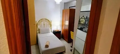 Cama o camas de una habitación en Alojamiento LT