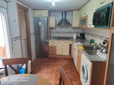 Una cocina o zona de cocina en Alojamiento LT