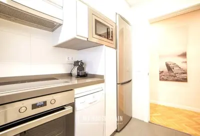 Una cocina o zona de cocina en MyHouseSpain - Superb apartment close to Madrid City Center