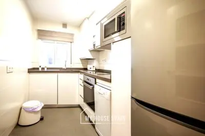 Una cocina o zona de cocina en MyHouseSpain - Superb apartment close to Madrid City Center