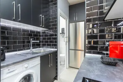Una cocina o zona de cocina en Gran Vía Apartment
