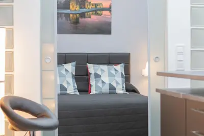 Cama o camas de una habitación en Gran Vía Apartment