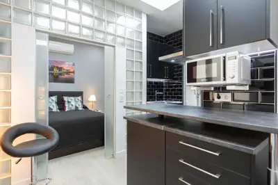Una cocina o zona de cocina en Gran Vía Apartment
