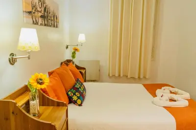Cama o camas de una habitación en Gran Via Alaia Seasonal Living