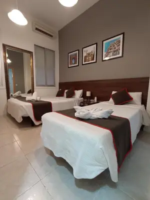 Cama o camas de una habitación en CH Murallas II