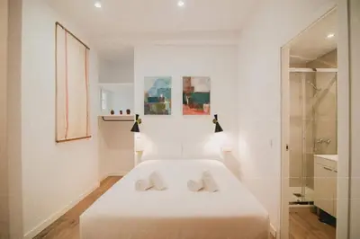 Cama o camas de una habitación en CHARMING DESIGN APARTMENT REINA SOFIA