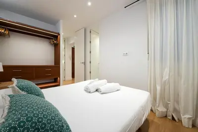 Cama o camas de una habitación en Chamberi I calle Monteleón 2BR 2BH