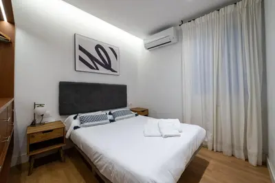 Cama o camas de una habitación en Chamberi I calle Monteleón 2BR 2BH