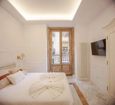 Cama o camas de una habitación en Plaza España V calle San Bernardino 6BR 6BH