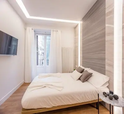 Cama o camas de una habitación en Plaza España V calle San Bernardino 6BR 6BH