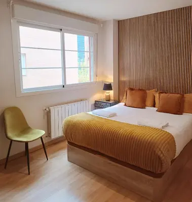 Cama o camas de una habitación en Fridda House Atocha Madrid