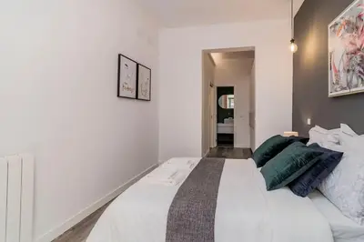 Cama o camas de una habitación en Magistral Apartamento a solo pasos de Gran Vía