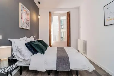 Cama o camas de una habitación en Magistral Apartamento a solo pasos de Gran Vía
