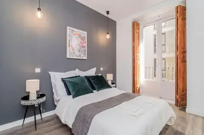 Cama o camas de una habitación en Magistral Apartamento a solo pasos de Gran Vía