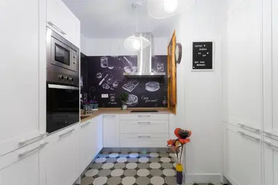 Una cocina o zona de cocina en Chic Apartment Madrid Goya by Batuecas