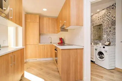 Una cocina o zona de cocina en Bright apartment near Casa de Campo by Batuecas