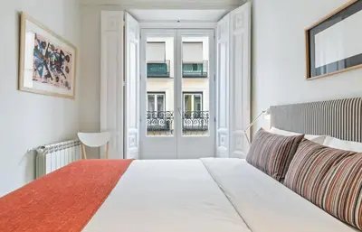 Cama o camas de una habitación en Waou Chueca III - Alquiler Corta Duración