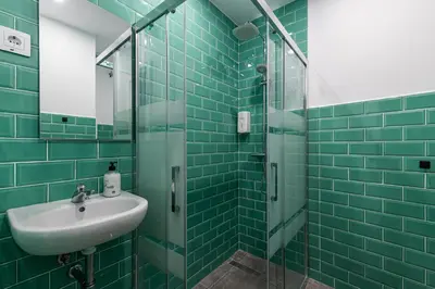 Un baño de Art Seven Hostel Capsules