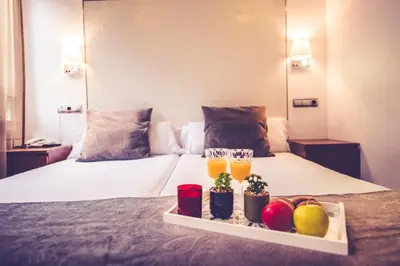 Cama o camas de una habitación en Hostal Sol Los Angeles