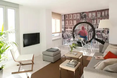 Una televisión o centro de entretenimiento en Eric Vökel Boutique Apartments - Atocha Suites